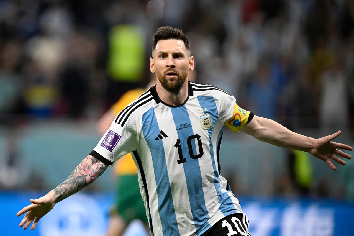 101406547-argentinas-forward-10-lionel-messi-celebrates-after-he-scored-his-teams-first-goal-duri